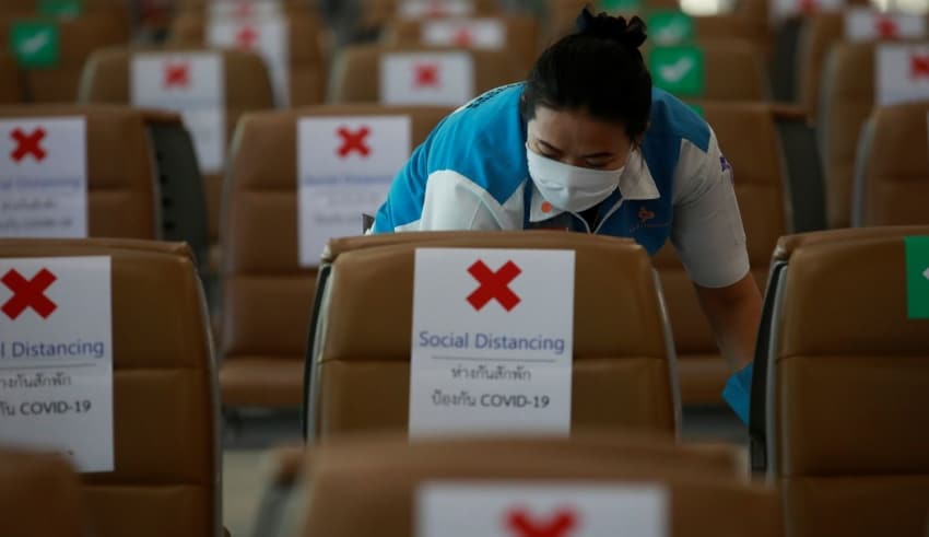 Airport staff wearing a protective face mask