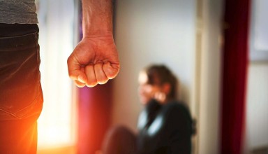 Man beating up his wife illustrating domestic violence