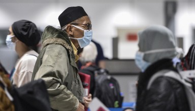 Passengers wearing safety masks in Airport