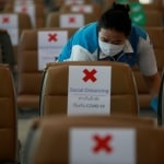 Airport staff wearing a protective face mask