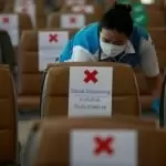 Airport staff wearing a protective face mask