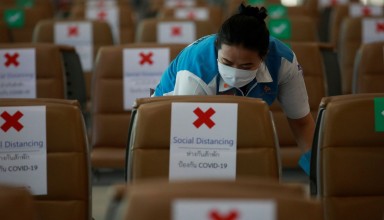 Airport staff wearing a protective face mask