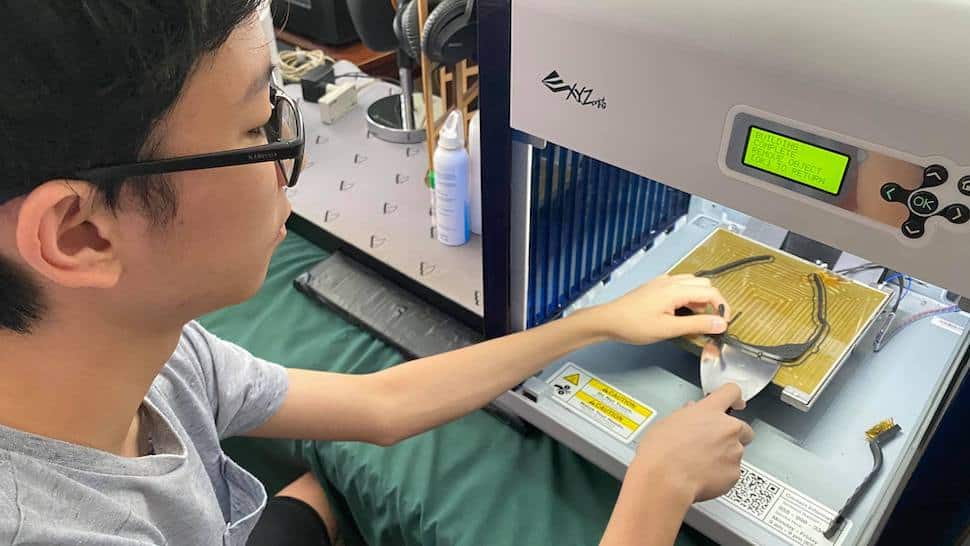 Marcus Chu, 16, grade 10 was printing 3D filaments to use for the face shields of frontliners.