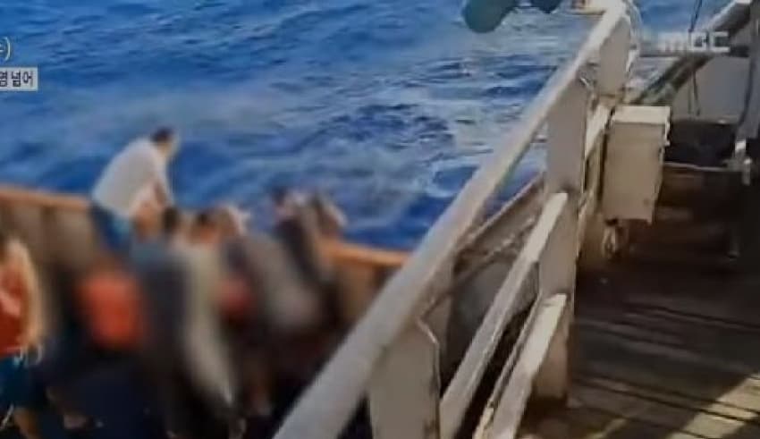 A video showing the throw out of the body of Indonesian ship crew from chinese ship