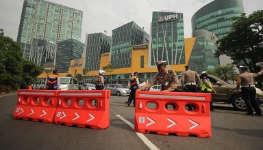 Surabaya city authorities and police stopped numerous car