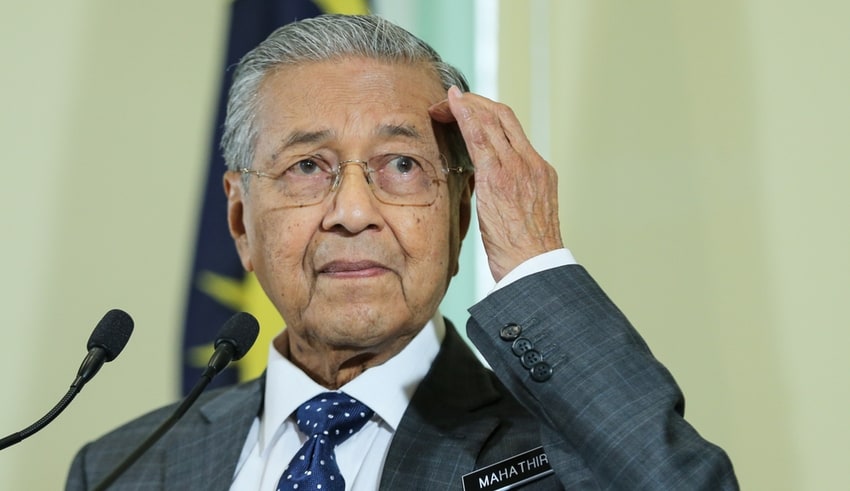 Former Malaysia Prime Minister Mahathir Mohamad speaks during a conference