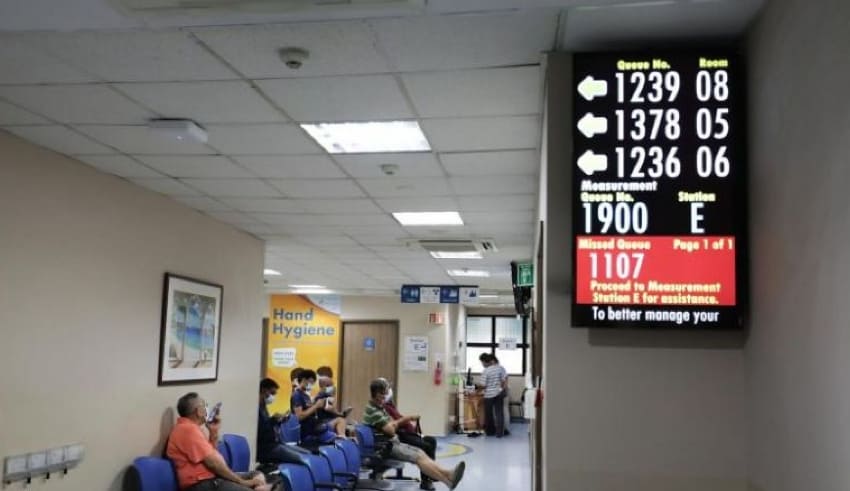 Singapore people are waiting outside hospital