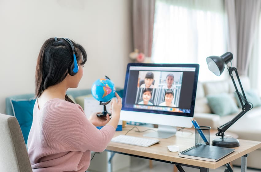 Asian Teacher teaches via video conference for Online class