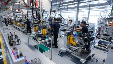 South East Asia Workers at engine assembly plant