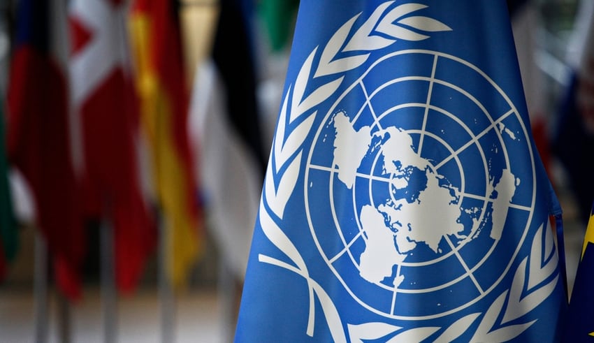 Flags of UN and EU stand in European council Building