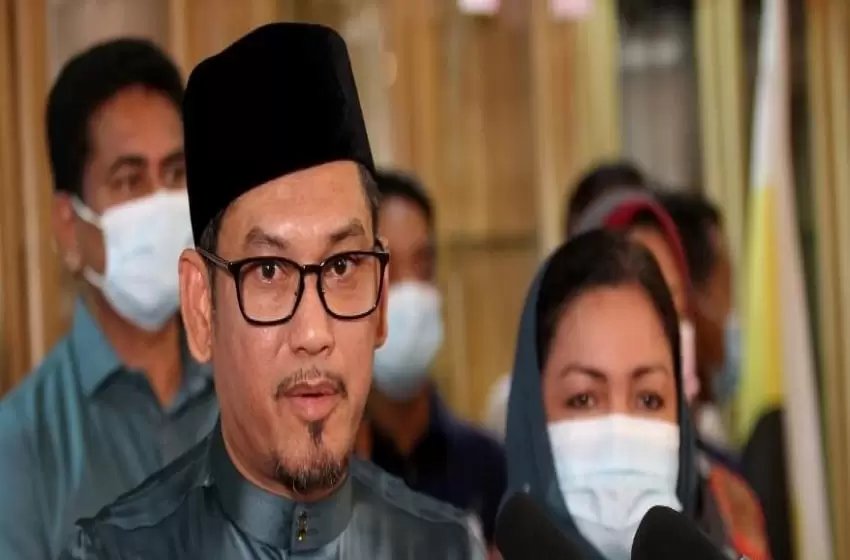 Former Minister Datuk Seri Ahmad Faizal Azumu indicates the return