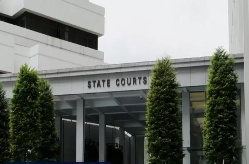 A Singapore court sentences an Australian to prison for throwing a wine bottle and murdering a man.