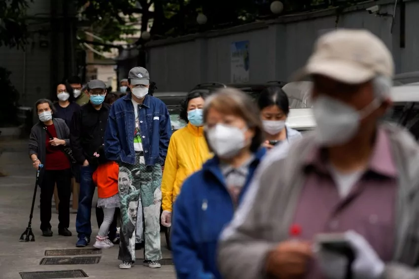 As COVID-19 infections grow, Macao locks down buildings