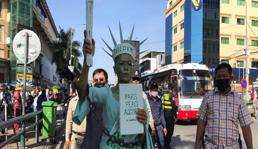 Cambodian court imprisons an American lawyer and dozens of others for treason