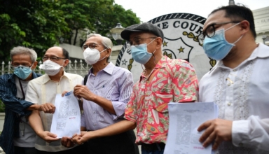 Cases against Marcos' presidential campaign are thrown out by the Supreme Court