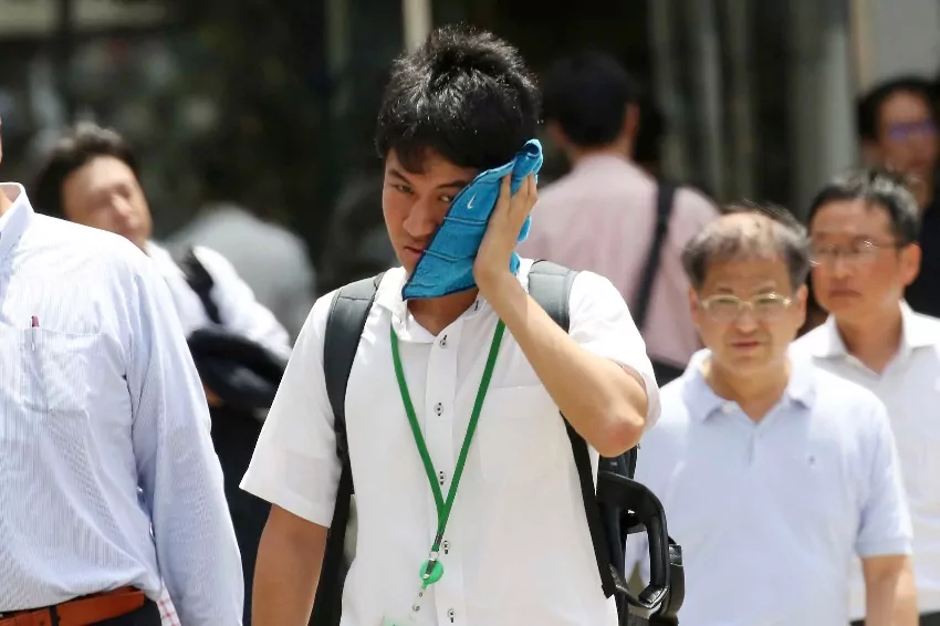 As Japan's east heats up, citizens are encouraged to save power