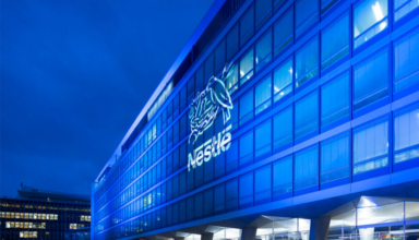 Nestle boosts organic growth, cuts margin guidance