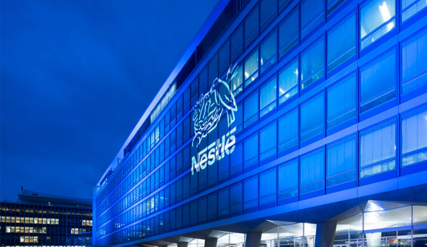 Nestle boosts organic growth, cuts margin guidance