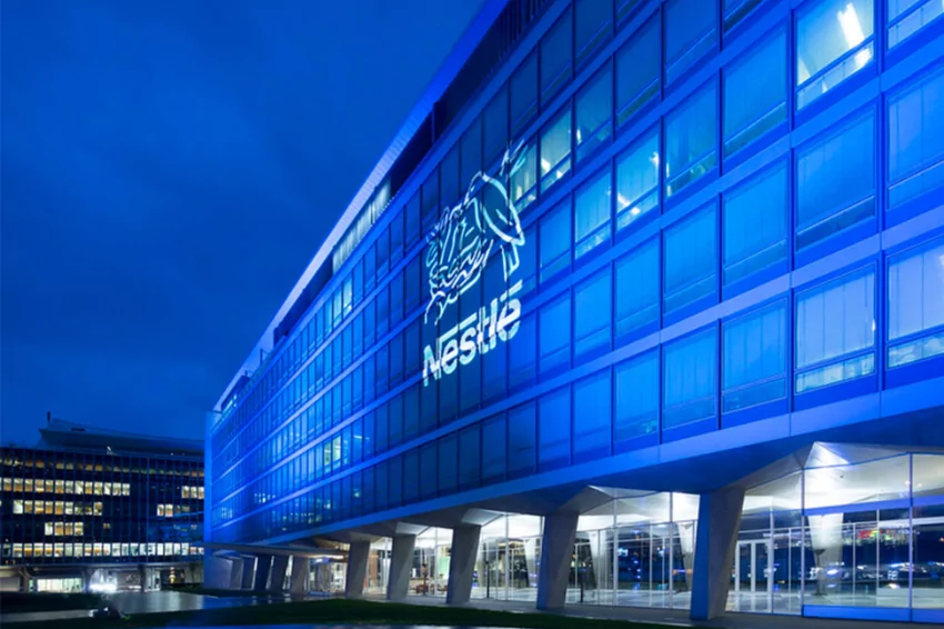 Nestle boosts organic growth, cuts margin guidance
