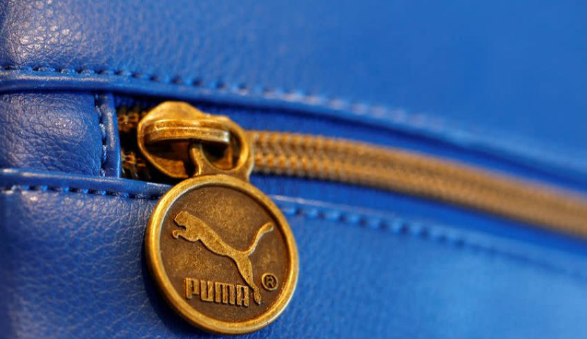Puma raises sales forecast, handles China better than Adidas