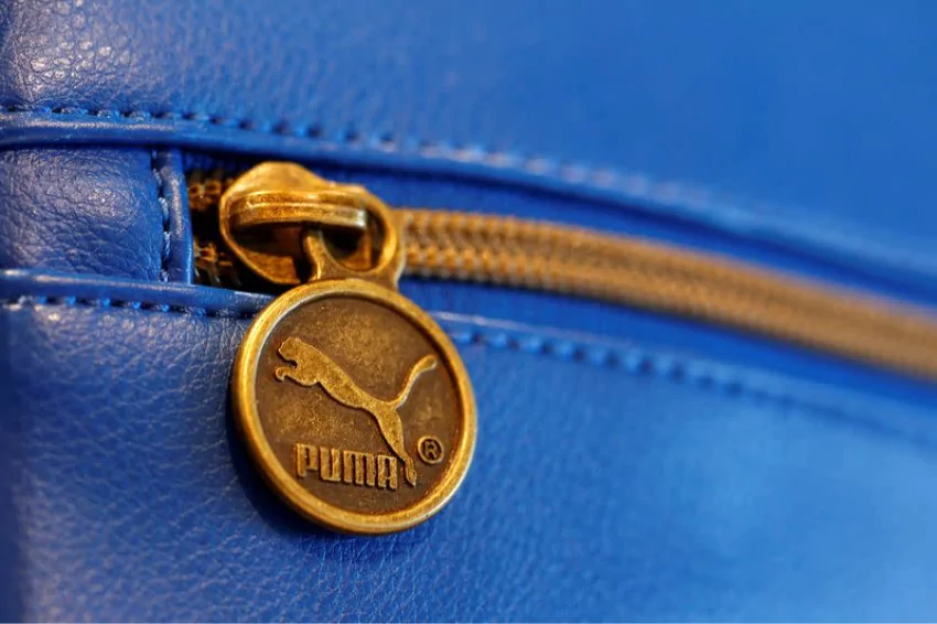 Puma raises sales forecast, handles China better than Adidas