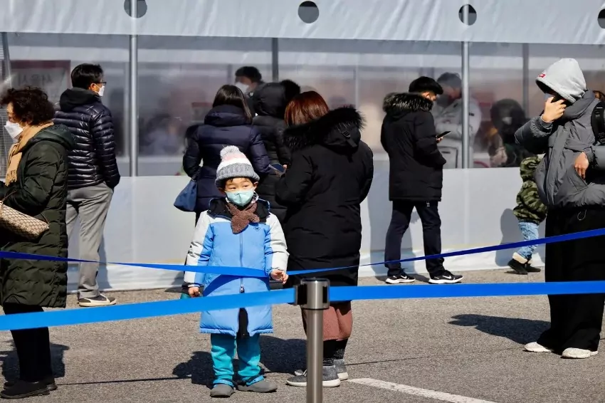 South Korea's PM warns of a COVID-19 outbreak as cases soar