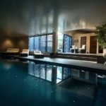 The owners' 'office' is a heated pool in the basement of their Singapore home