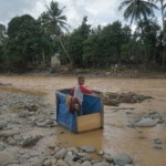 Villagers in Kalimantan, Indonesia, use outdated floating toilets to get by