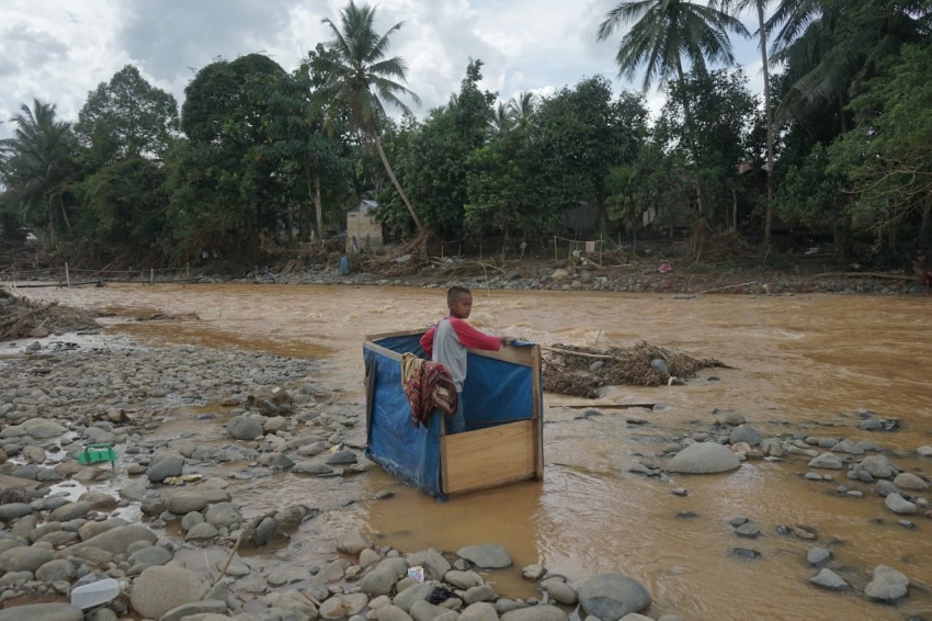 Villagers in Kalimantan, Indonesia, use outdated floating toilets to get by