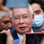 Mahathir thinks Najib would walk free if graft-tainted party wins