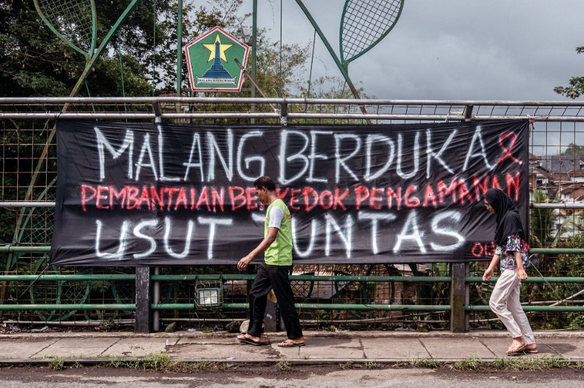 Six charged over Indonesia football stadium disaster