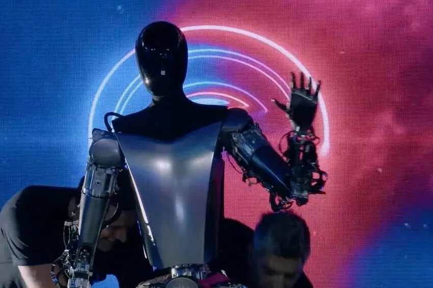 Tesla's robot can wave now, Musk plans to make millions