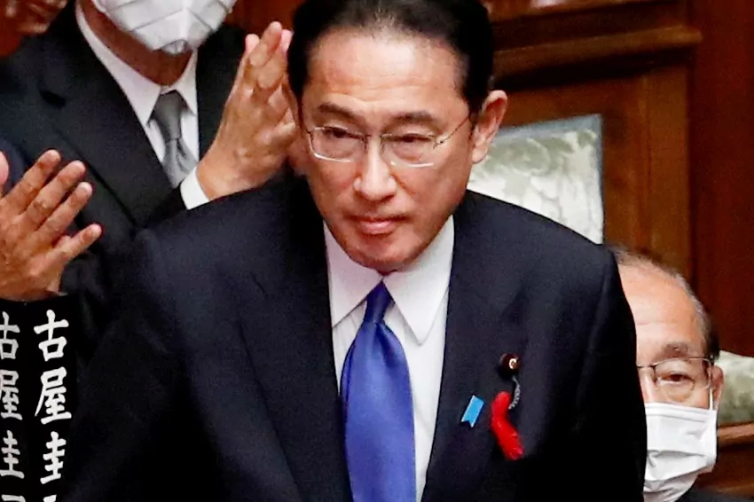 image: japan's newly elected prime minister fumio kishida is applauded after being chosen as the new prime minister, at the lower house of parliament in tokyo