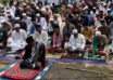 indonesians pray outside after catastrophic quake ruins town