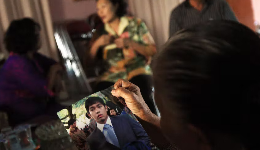 traumatized family in indonesia await news of loss