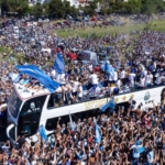 argentina's world cup heroes helicoptered as street party spills