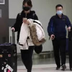 australia maintains chinese travel restrictions
