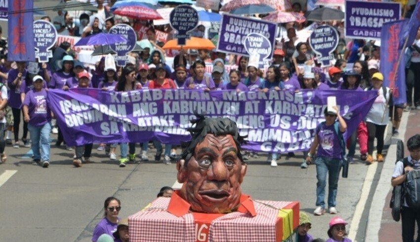 human rights day protestors accuse philippines president of extrajudicial executions