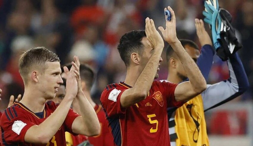 japan comes back to shock spain and the top group