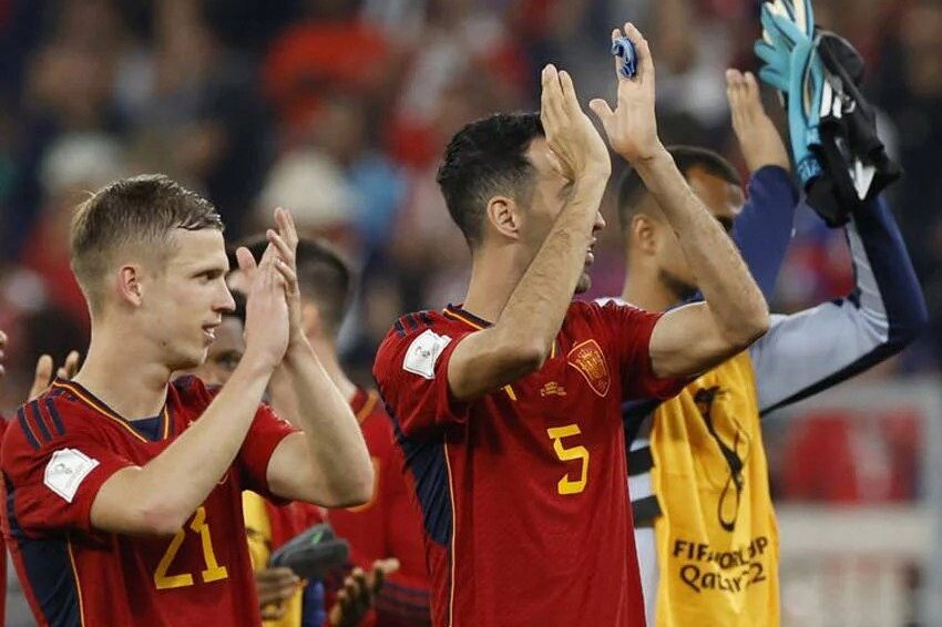 japan comes back to shock spain and the top group