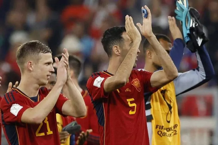 japan comes back to shock spain and the top group