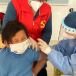 coronavirus disease (covid 19) vaccination to elderly people at a vaccination center on the outskirts of shanghai