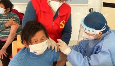 coronavirus disease (covid 19) vaccination to elderly people at a vaccination center on the outskirts of shanghai