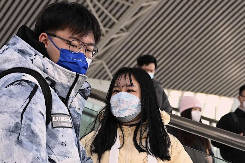 china says covid 19 epidemic reducing before travel rush