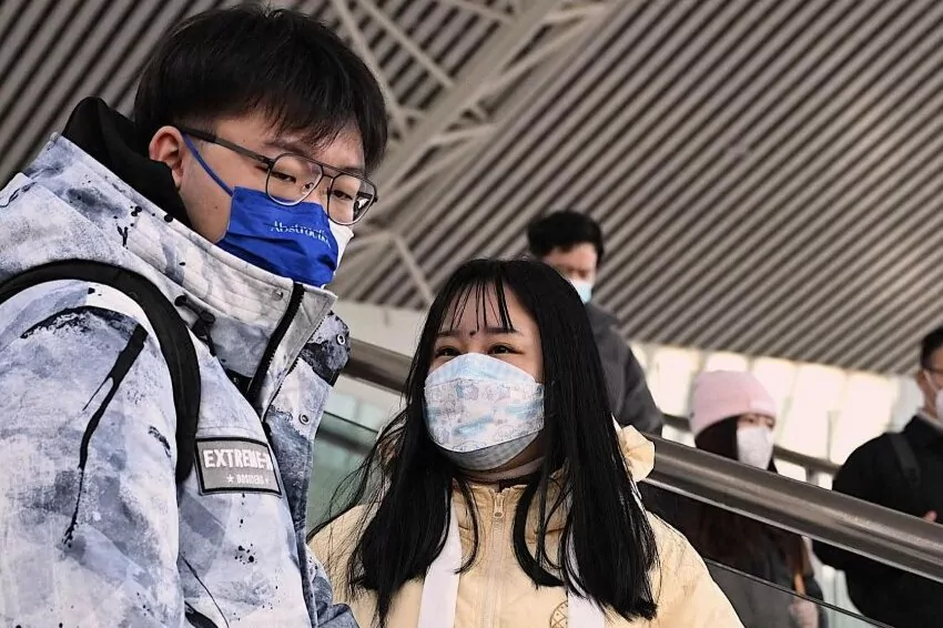 china says covid 19 epidemic reducing before travel rush