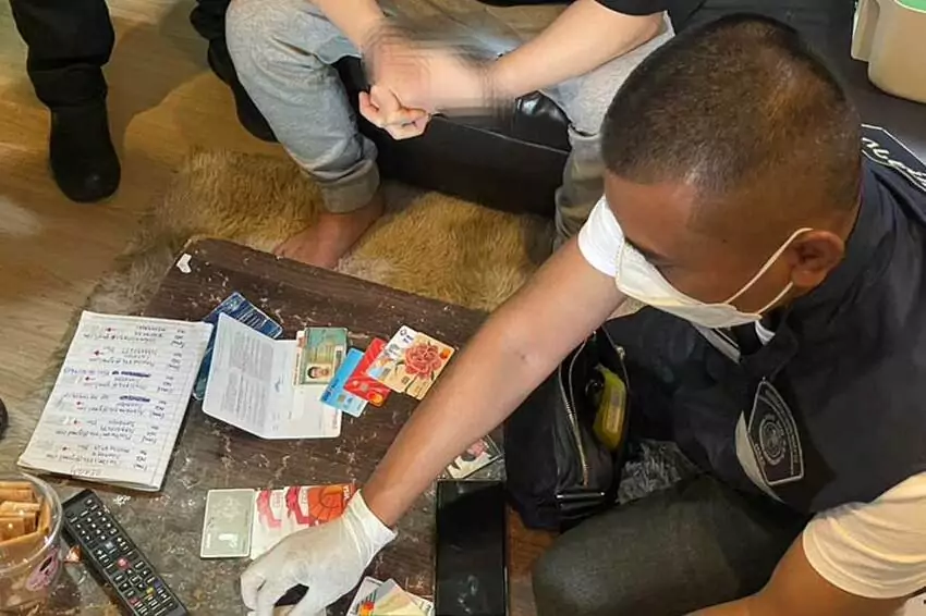 hacker fled singapore and was arrested in bangkok