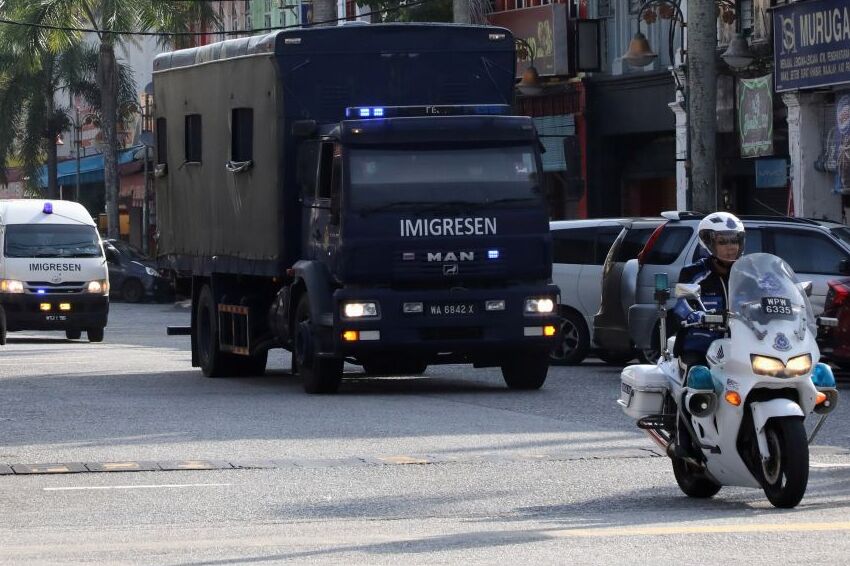 an immigration truck carrying myanmar migrants to be deported from malaysia is seen in lumut