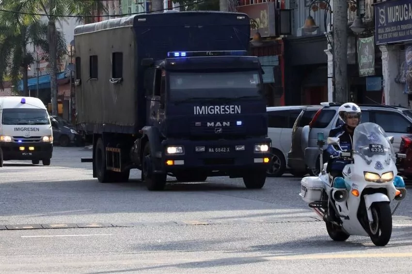 an immigration truck carrying myanmar migrants to be deported from malaysia is seen in lumut