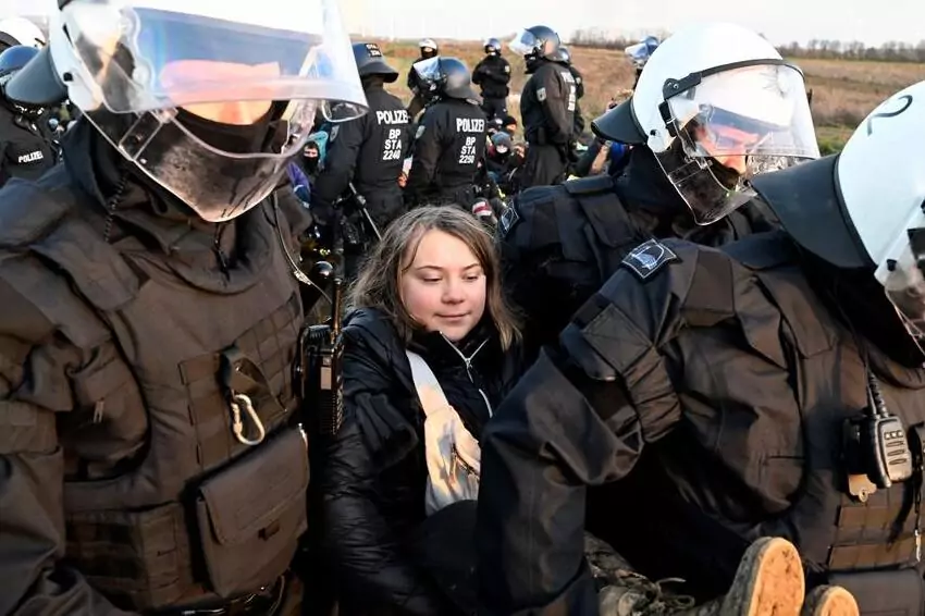 greta thunberg detained by norwegian police during a protest