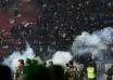 two released, one policeman arrested for indonesia stadium crush